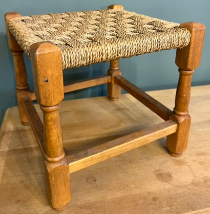 Vintage Woven Rattan Stool with Beige Rope top.