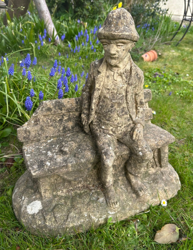 Vintage Weathered Man on bench statue