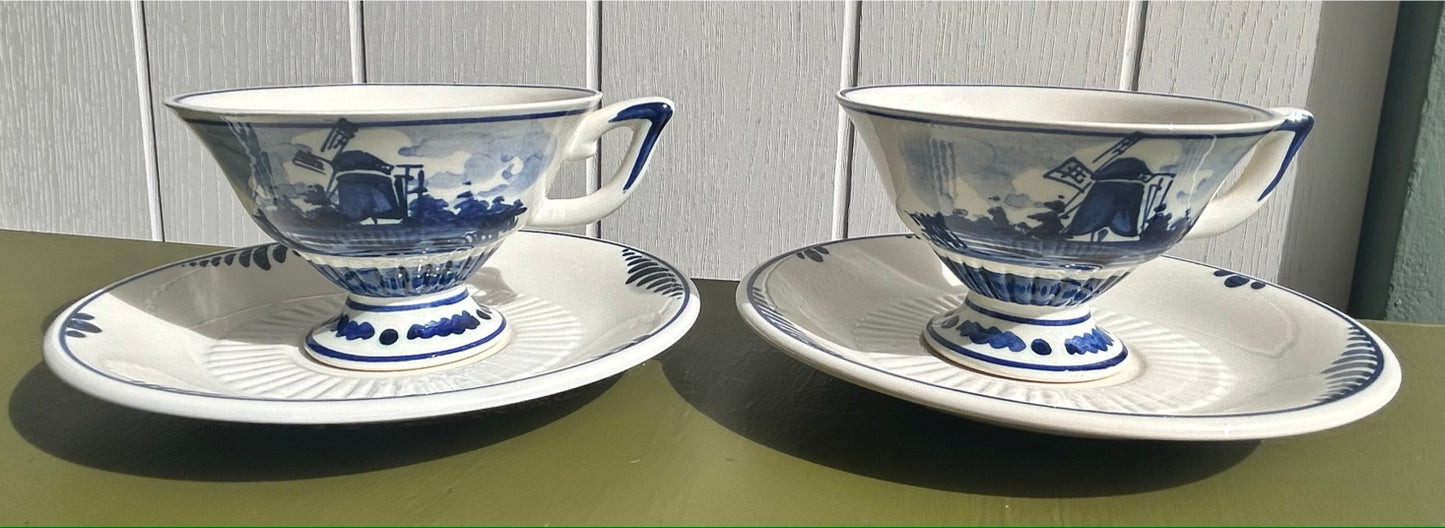 Pair of Delft Blue and White China Cups and Saucers