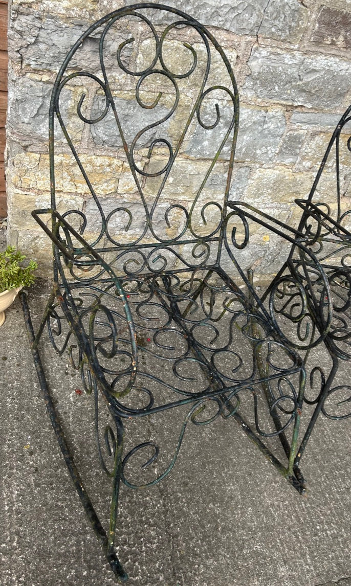 Pair of Antique Wrought Iron Garden Rocking Chairs