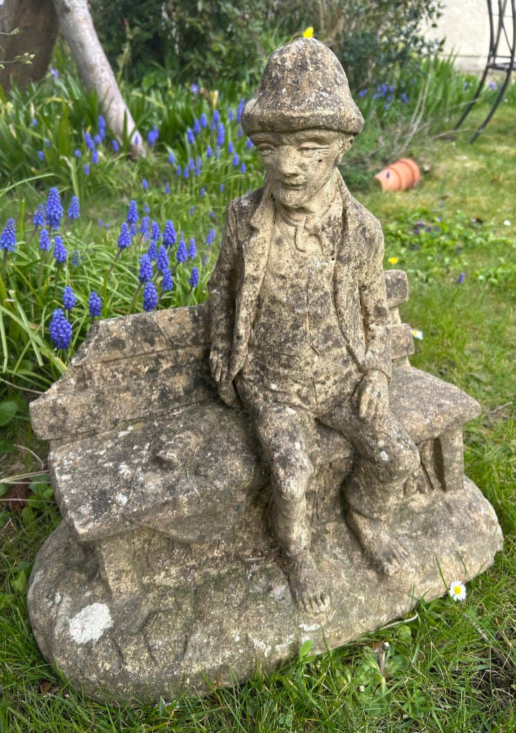 Vintage Weathered Man on bench statue
