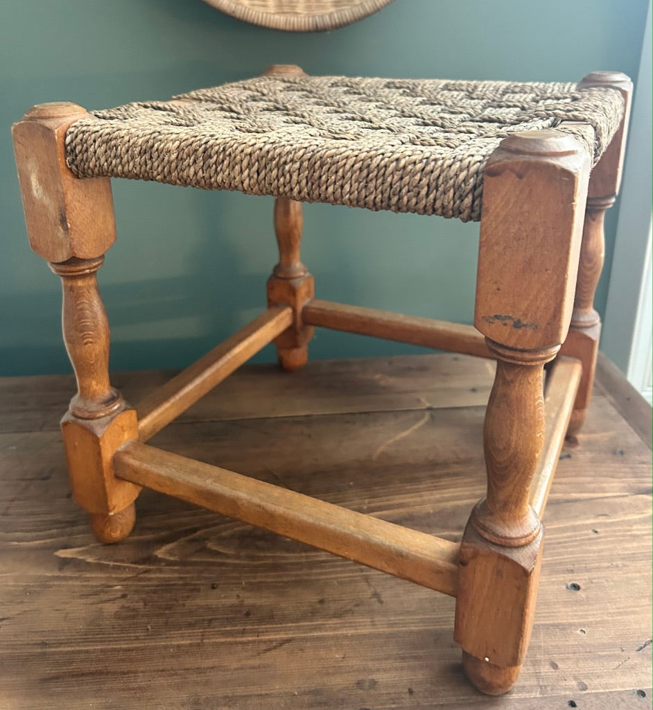 Vintage Woven Rattan Stool with Beige Rope top.