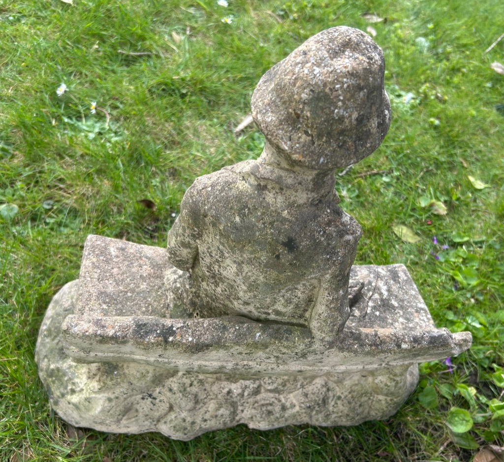 Vintage Weathered Man on bench statue
