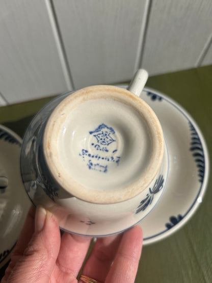 Pair of Delft Blue and White China Cups and Saucers