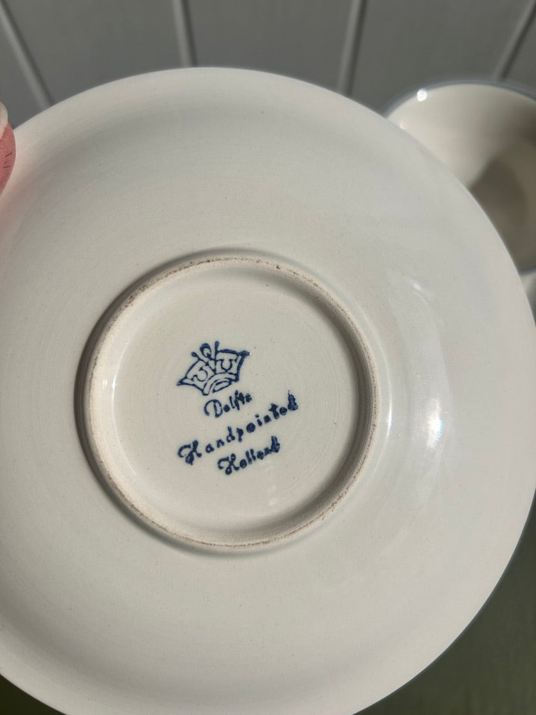 Pair of Delft Blue and White China Cups and Saucers