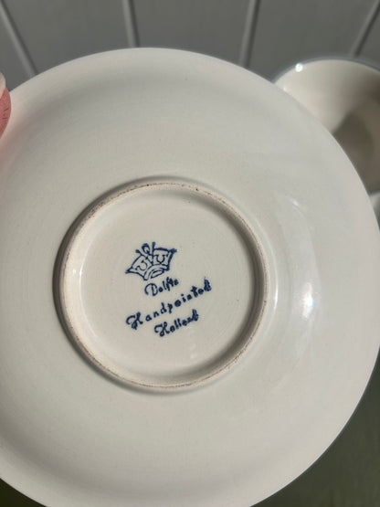 Pair of Delft Blue and White China Cups and Saucers