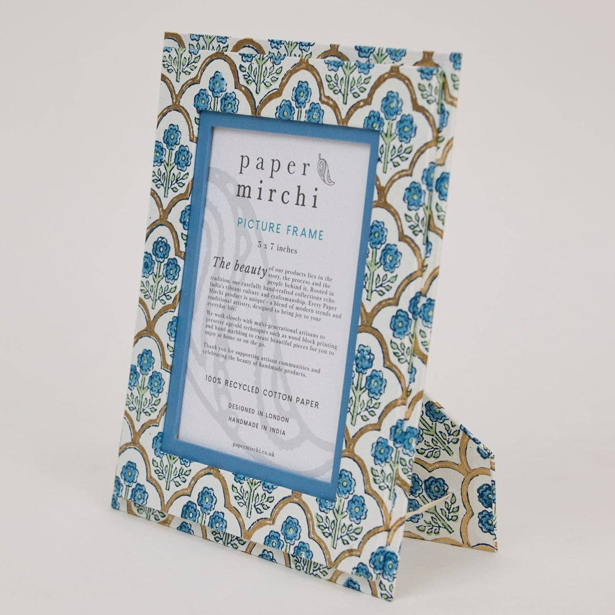 Decorative picture frame with floral pattern on a white background
